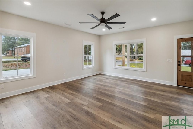 215 Wildwood Dr, Sylvania, GA 30467 - unfurnished room with plenty of natural light, wood finished floors, a ceiling fan, and recessed lighting