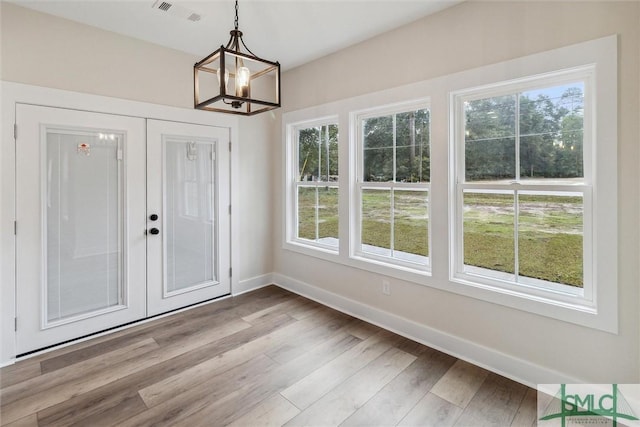 215 Wildwood Dr, Sylvania, GA 30467 - unfurnished sunroom with a chandelier and french doors