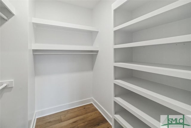 215 Wildwood Dr, Sylvania, GA 30467 - spacious closet with wood finished floors