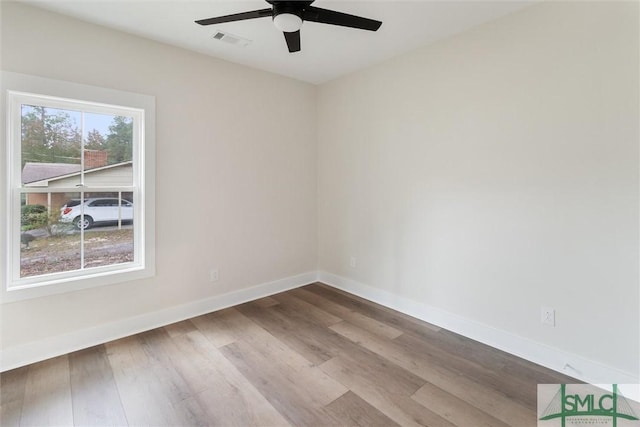215 Wildwood Dr, Sylvania, GA 30467 - spare room with a ceiling fan and wood finished floors