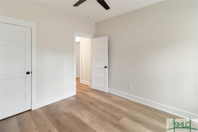 215 Wildwood Dr, Sylvania, GA 30467 - unfurnished bedroom featuring light wood-type flooring and ceiling fan
