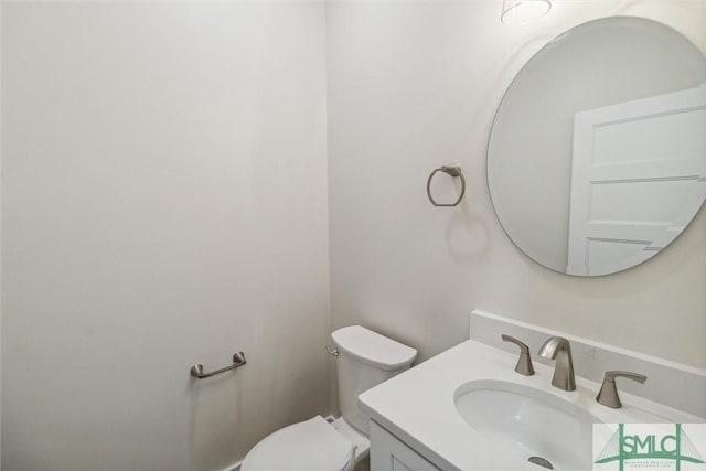 215 Wildwood Dr, Sylvania, GA 30467 - bathroom with toilet and vanity