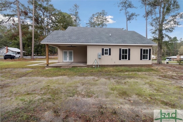 215 Wildwood Dr, Sylvania, GA 30467 - back of property with french doors, a shingled roof, and a ceiling fan
