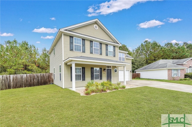 view of front of house featuring a garage and a front yard