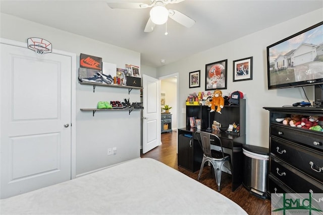 bedroom with dark wood-type flooring and ceiling fan