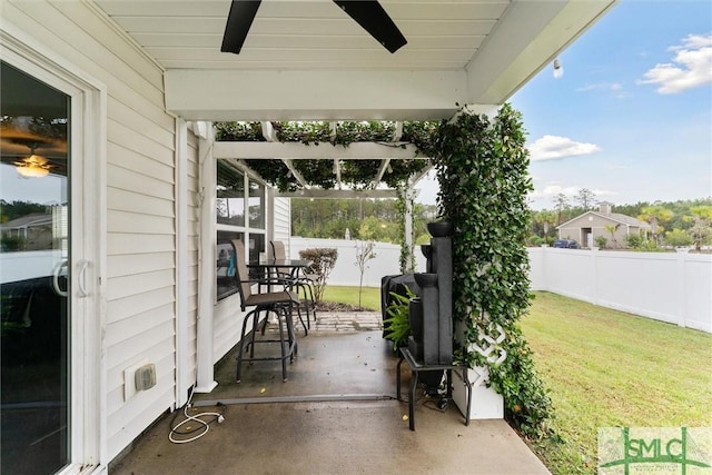 view of patio / terrace featuring ceiling fan