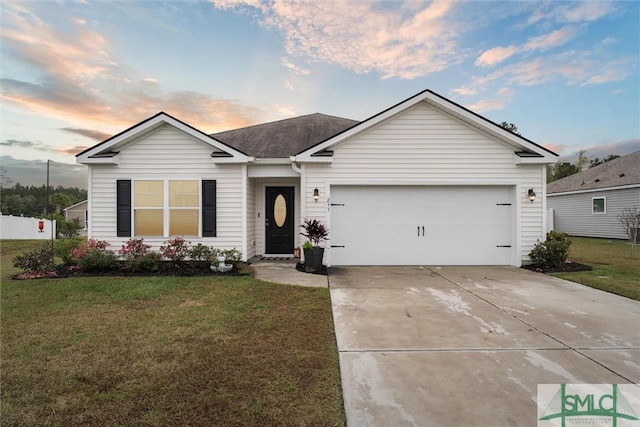 single story home with a garage and a lawn