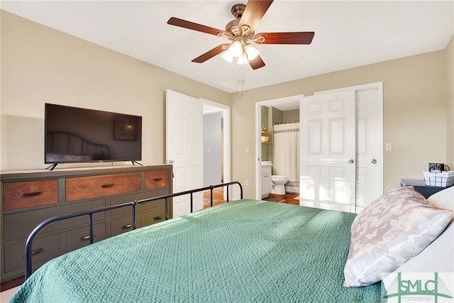 bedroom featuring ceiling fan and ensuite bath