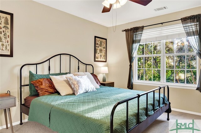 carpeted bedroom featuring ceiling fan