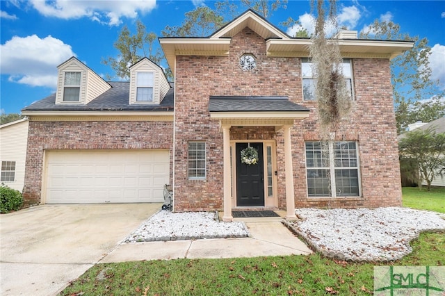 view of property featuring a garage