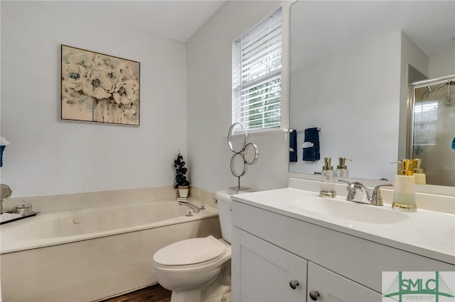 full bathroom featuring hardwood / wood-style flooring, vanity, toilet, and plus walk in shower