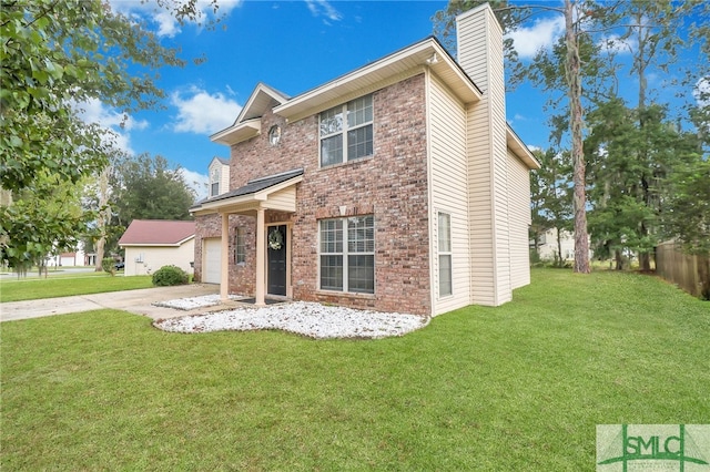 view of front of house with a garage and a front lawn