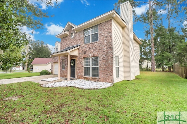 view of front facade featuring a front yard