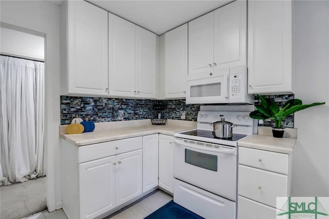 210 Parkview Ct, Savannah, GA 31419 - kitchen with white appliances, light countertops, white cabinets, and decorative backsplash