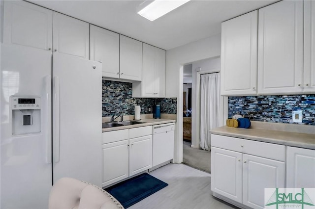 210 Parkview Ct, Savannah, GA 31419 - kitchen featuring white appliances, light countertops, and backsplash