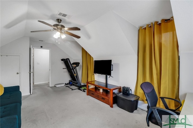 exercise area featuring vaulted ceiling and ceiling fan