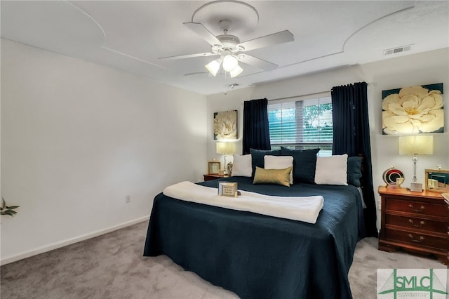 carpeted bedroom with ceiling fan