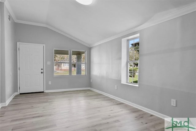 705 W 47th St, Savannah, GA 31405 - foyer featuring vaulted ceiling, ornamental molding, wood finished floors, and baseboards
