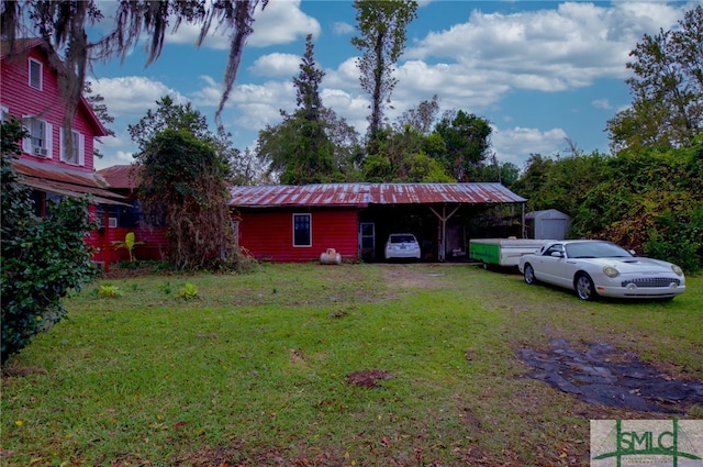 exterior space featuring a storage shed and a front lawn