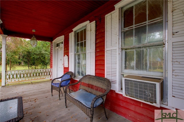 deck with a porch and heating unit