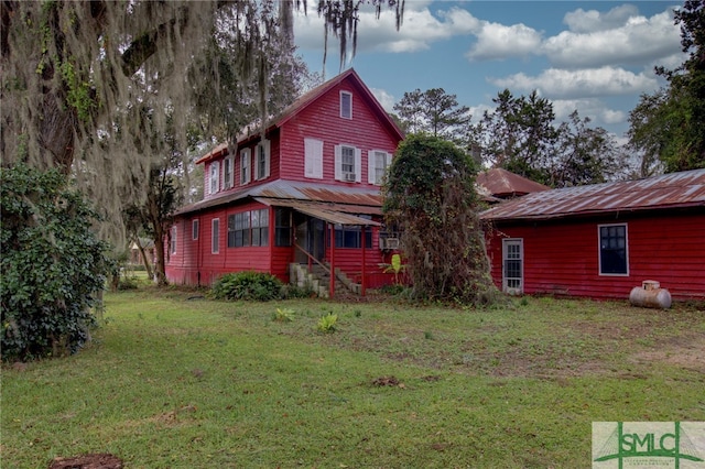 exterior space with a front lawn