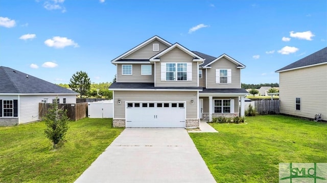 craftsman-style house with a garage and a front lawn