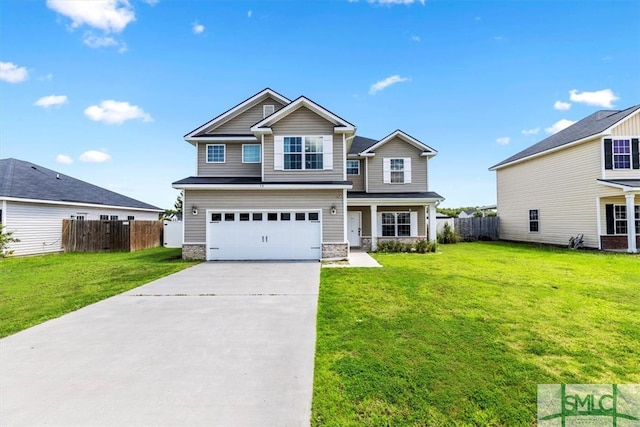 view of front facade with a garage and a front yard