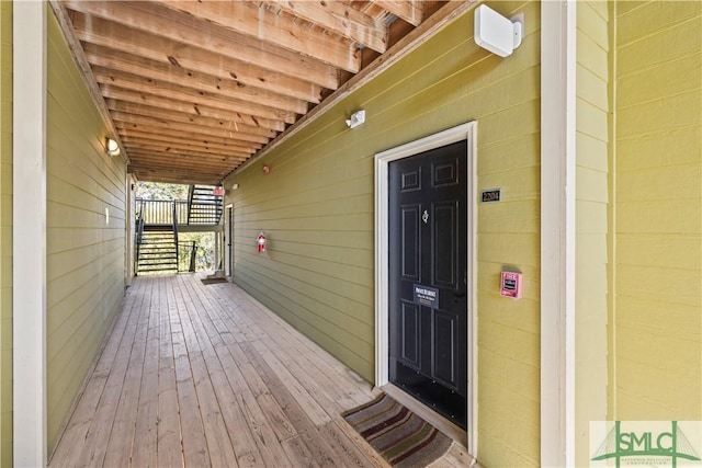 property entrance with covered porch