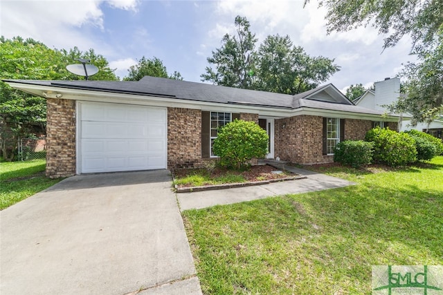 ranch-style home with a garage and a front lawn