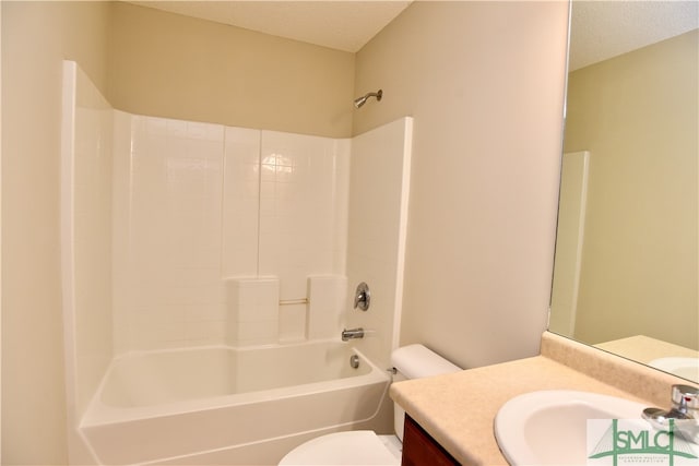 full bathroom with toilet, shower / bathing tub combination, vanity, and a textured ceiling