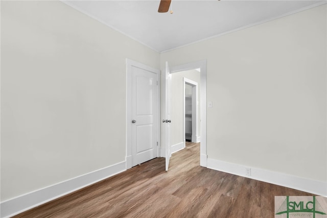 unfurnished room featuring wood-type flooring