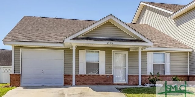 craftsman house with a garage