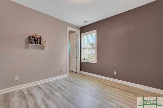 empty room featuring light hardwood / wood-style floors