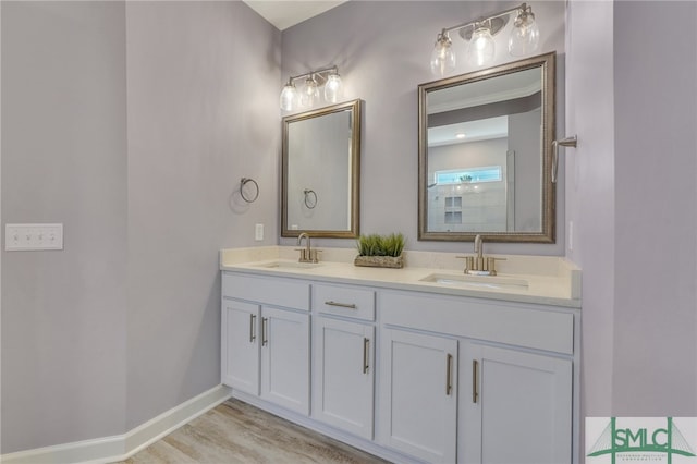 bathroom featuring vanity and hardwood / wood-style flooring