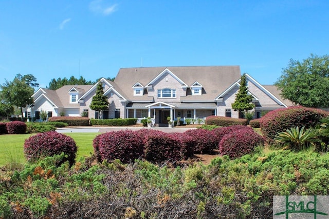 view of front of property with a front lawn