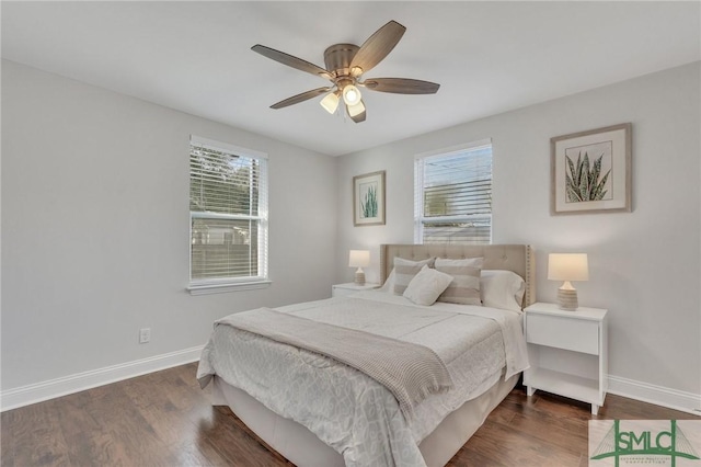 bedroom featuring ceiling fan and dark wood-type flooring