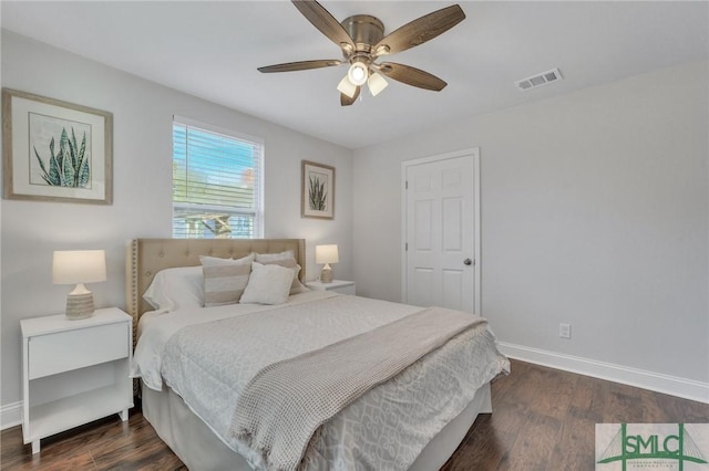 bedroom featuring ceiling fan and dark hardwood / wood-style flooring