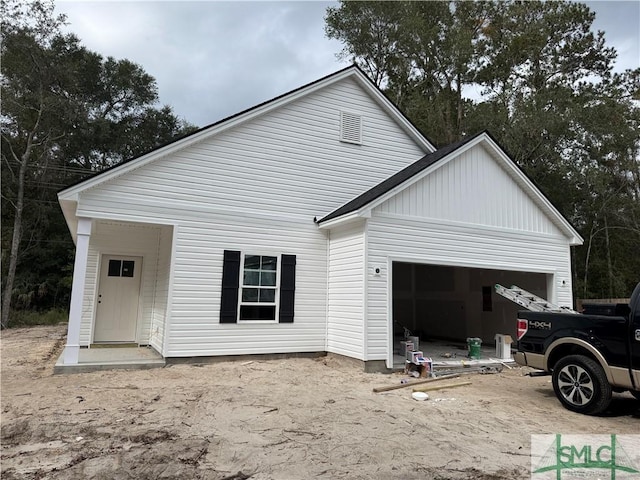 exterior space with a garage