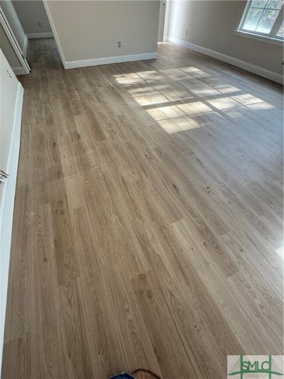 interior details featuring hardwood / wood-style floors