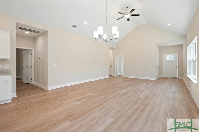 unfurnished living room with light wood-type flooring, visible vents, and baseboards