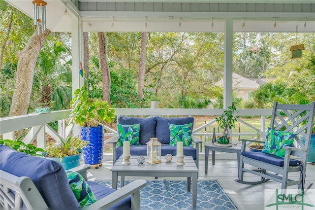 sunroom with plenty of natural light