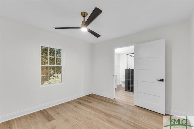 unfurnished bedroom featuring ceiling fan and light wood-type flooring