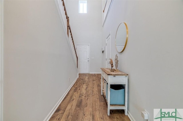 hall with light wood-type flooring