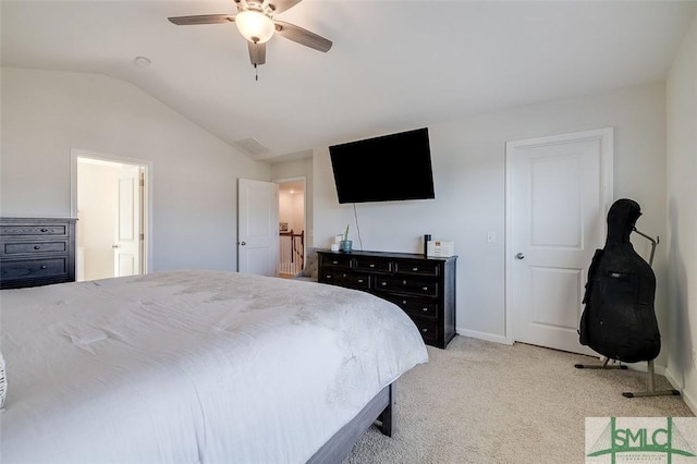 carpeted bedroom featuring vaulted ceiling and ceiling fan