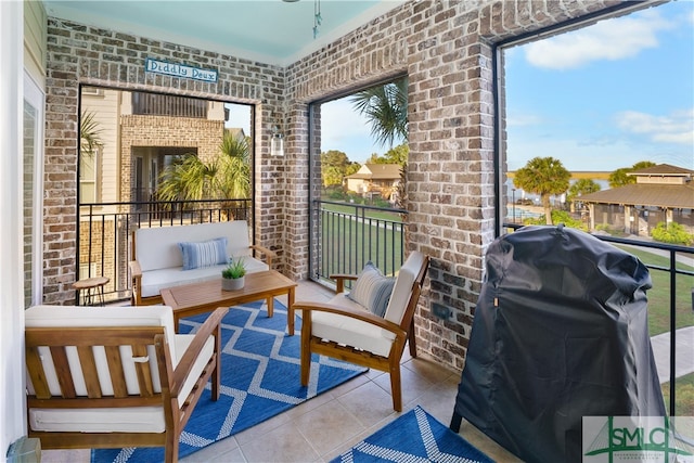 balcony featuring an outdoor hangout area and grilling area