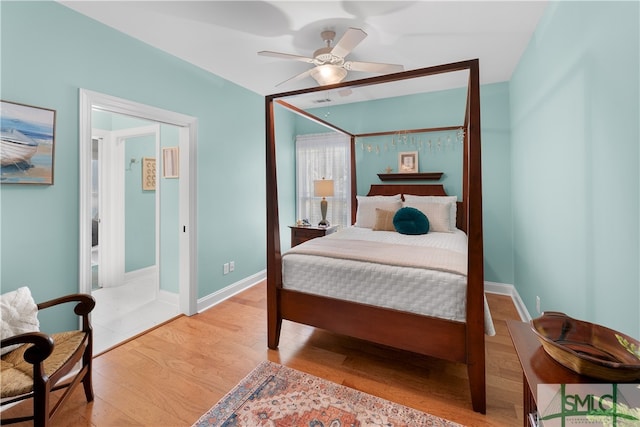 bedroom featuring ceiling fan and light hardwood / wood-style floors