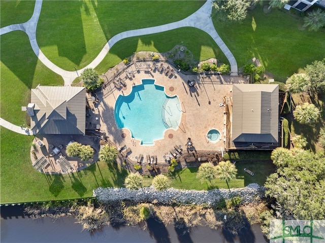 birds eye view of property featuring a water view