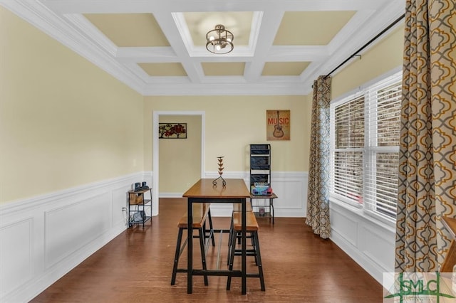 dining room featuring an inviting chandelier, coffered ceiling, ornamental molding, beamed ceiling, and dark hardwood / wood-style floors