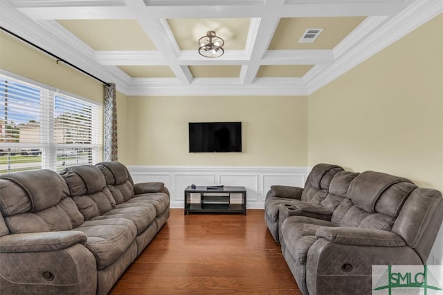 living room with coffered ceiling, dark hardwood / wood-style floors, and crown molding