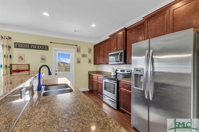 kitchen featuring dark hardwood / wood-style flooring, appliances with stainless steel finishes, sink, and crown molding